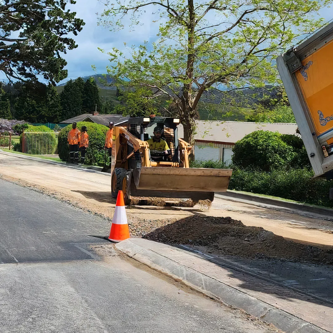 A construction crew is working on a road.